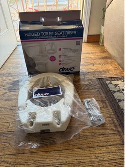 Toilet raise in excellent condition NEW