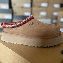 $100 UGG SLIDES