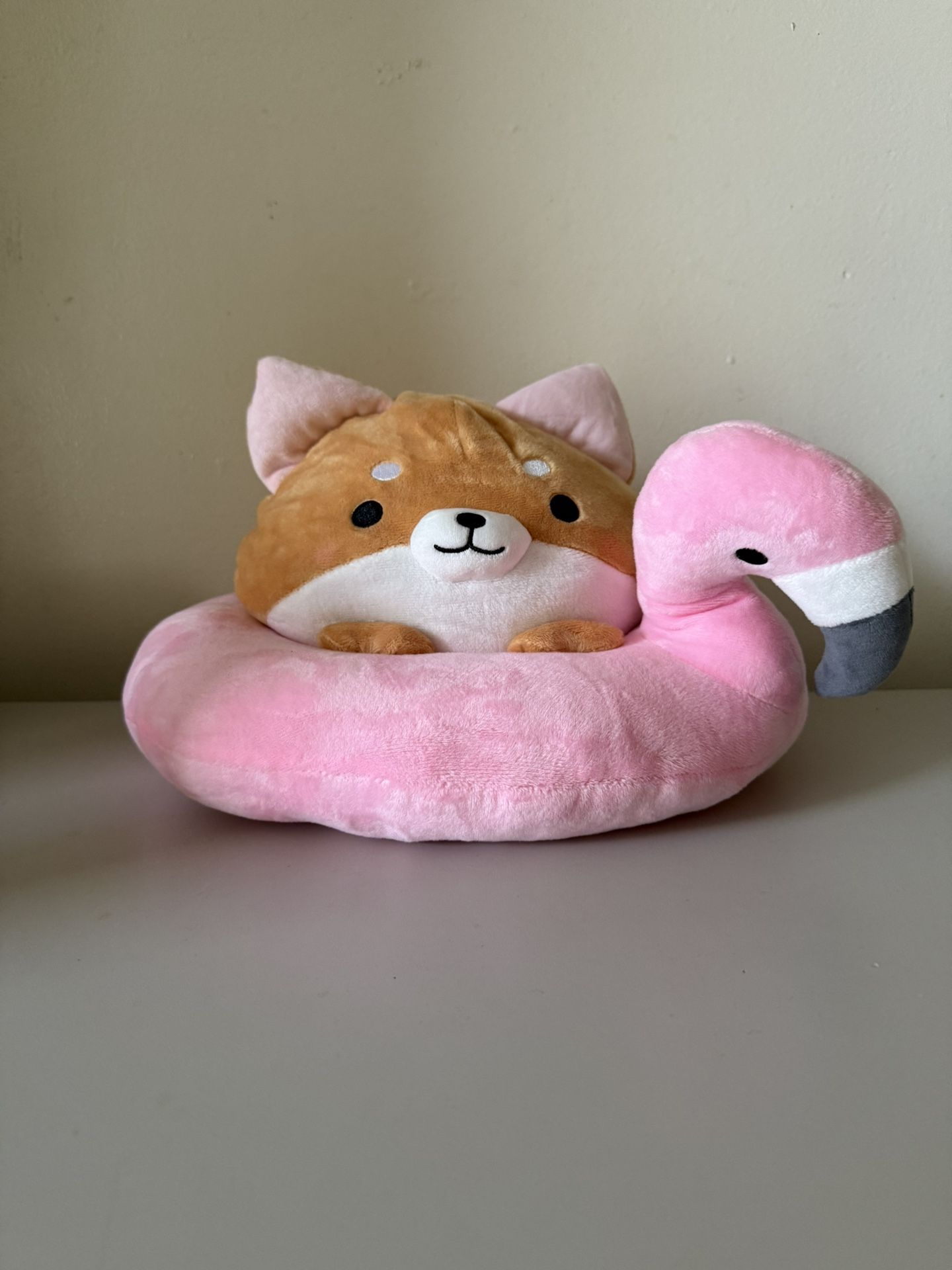 shiba inu in flamingo floatie plushie