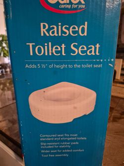 Raised toilet seat