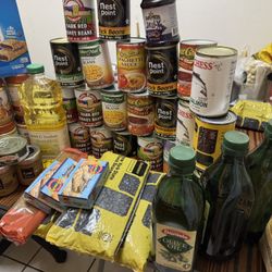 Cans & oil & peanut butter & noodles & beans