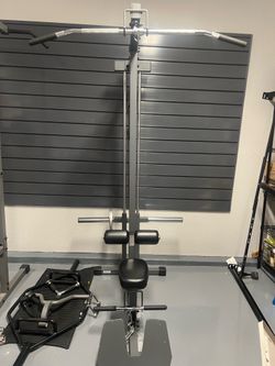 Loaded lat machine