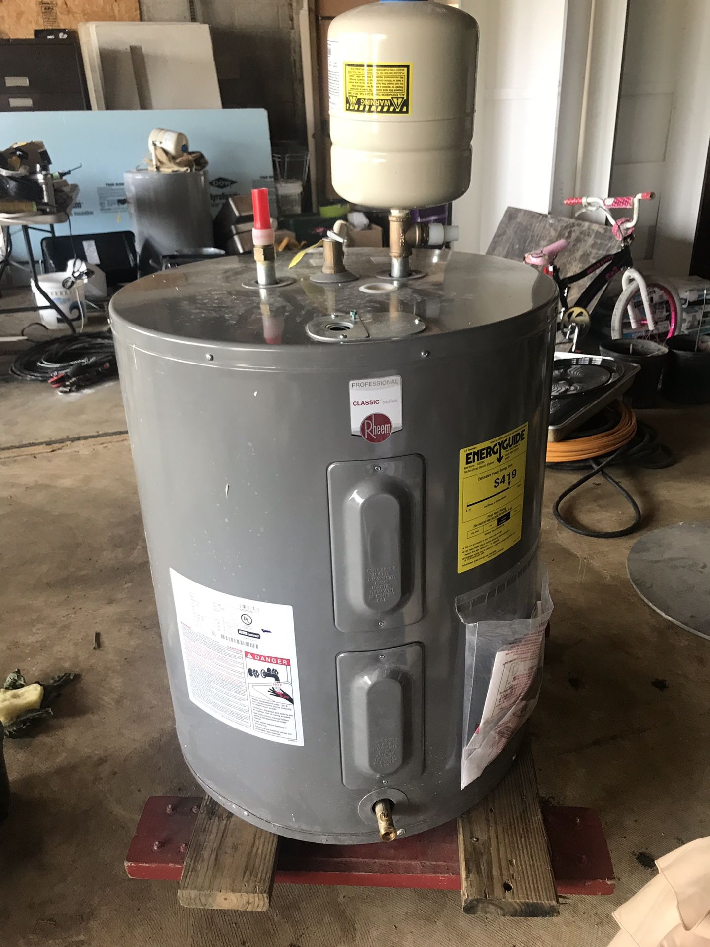 55 Gallons Electric water heater.