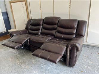 RECLINABLE BROWN LEATHER COUCH