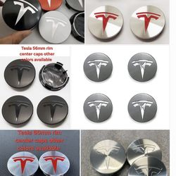 Tesla rim center caps see all pictures sold separately SHIPPING AVAILABLE