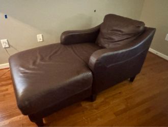 Brown leather chaise lounge chair