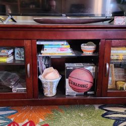 Nice wood TV and Stereo stand w Glass cabinet and shelf