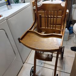 1900s High Chair Folds Down To Stroller