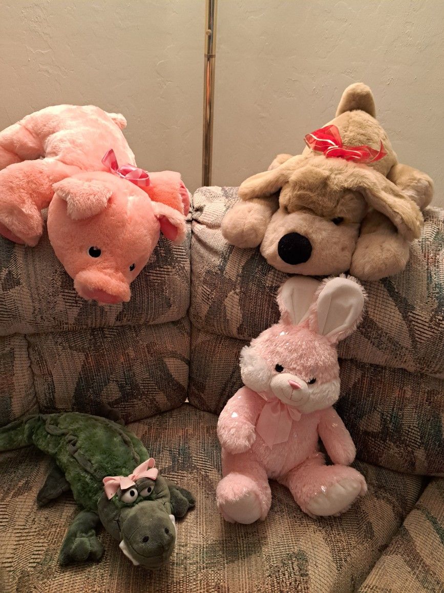 Four Very Nice Plushed Stuffed Animals
