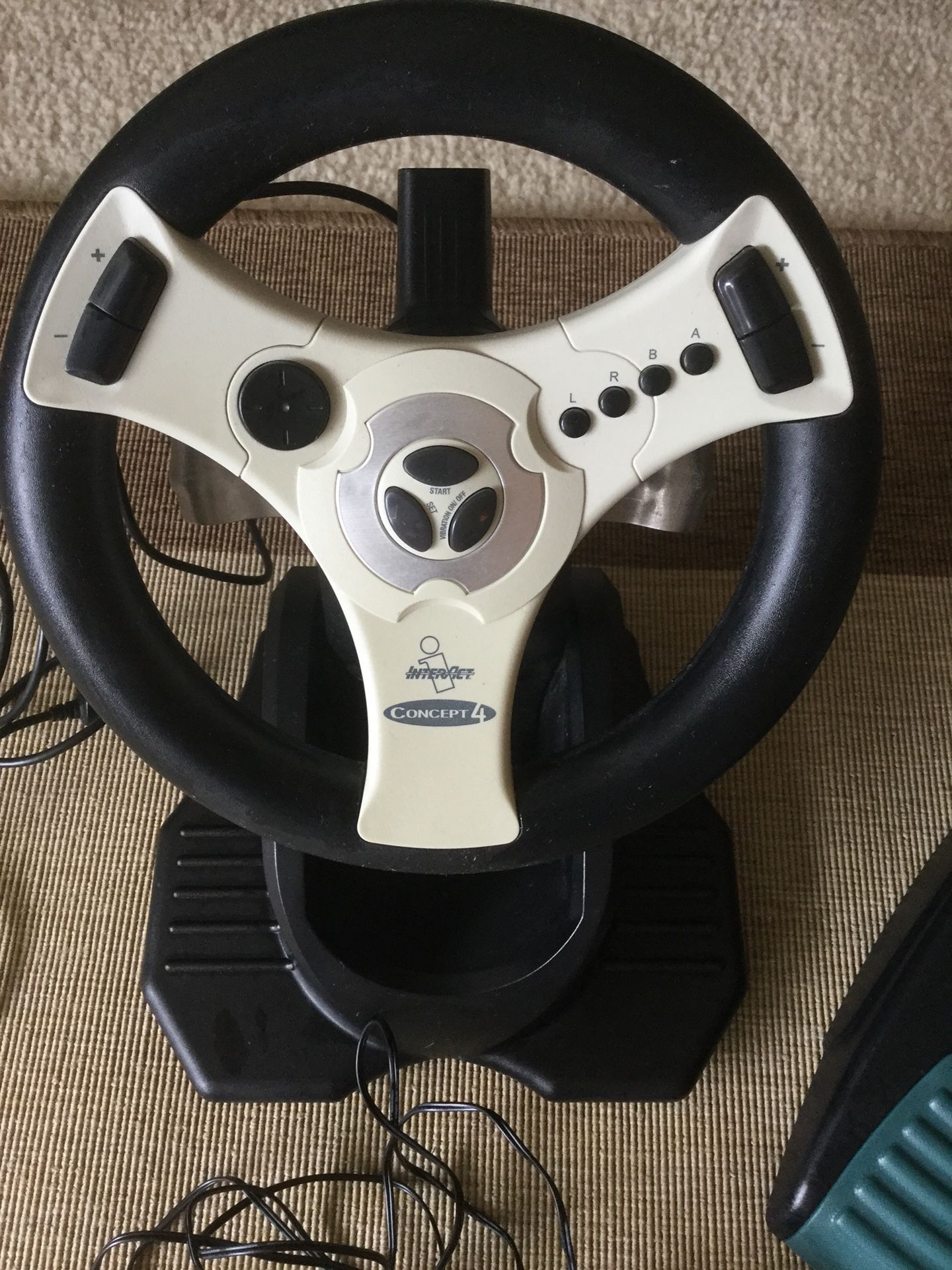 Gray and black Dreamcast steering wheel racing game controller / Visit for more items 😎👍