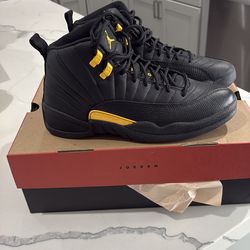 Jordans 12 black taxi men’s size 8.5