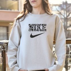Nike cow print crewneck hotsell