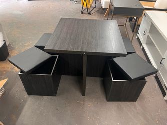 New in box dining table with 4 chairs
