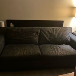 Blue Couch With Gold lining 