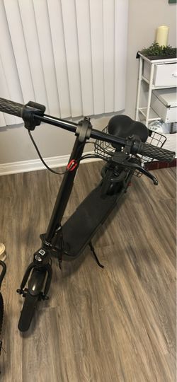 Electric scooter with basket