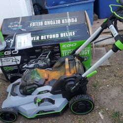E GO POWER MOWER BRAND NEW NOT BATTERY  Only CHARGER 