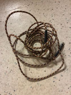 Charger cord phone holder - car