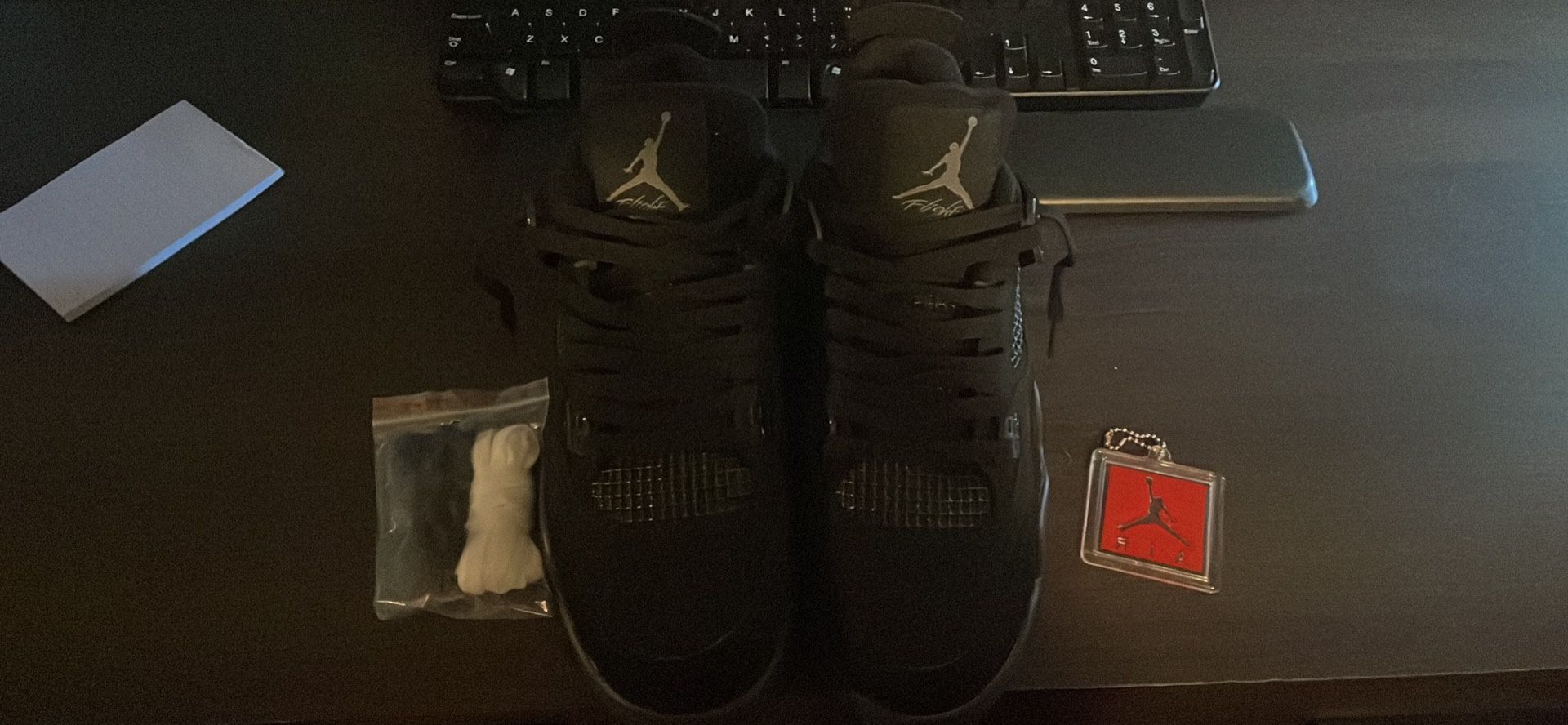 Size 9.5 Black Cats Jordan 4s 
