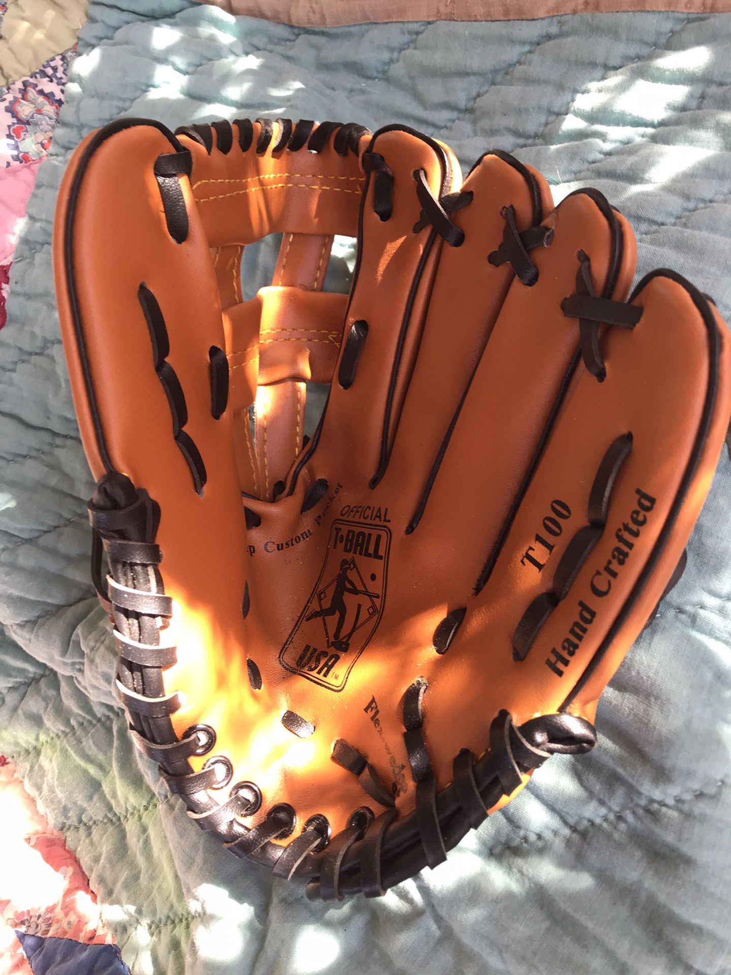 New T Ball Glove