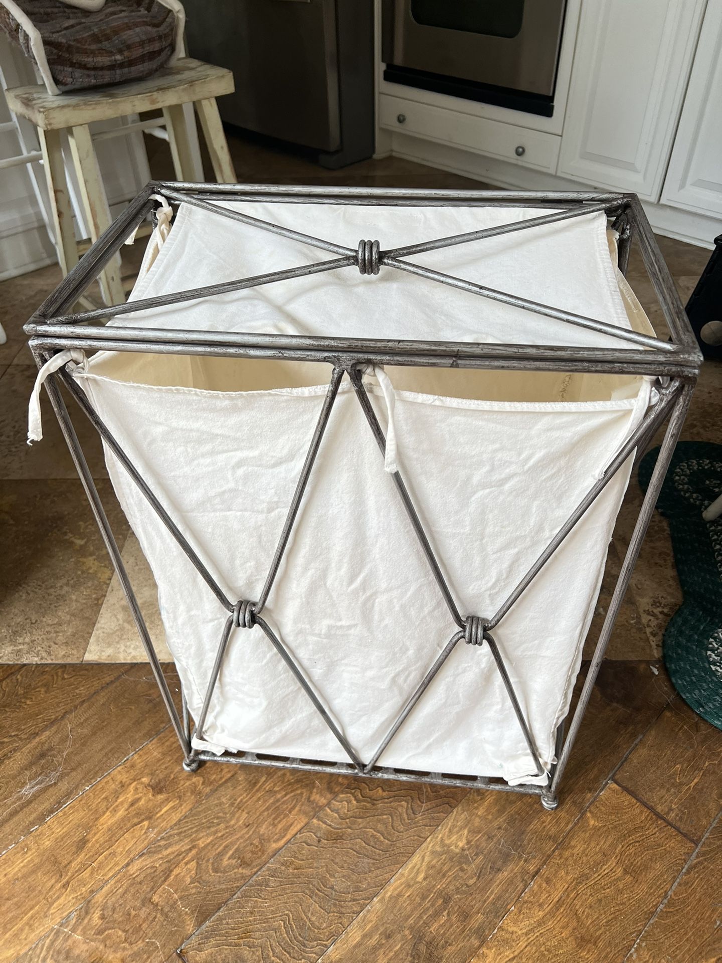 Pier 1, solid iron hamper