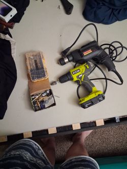 Drills one cordless one with cord attached plus alot of bits and battery plus charger
