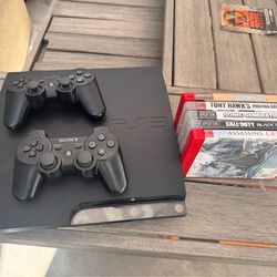 Play station 3 with controllers and games