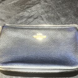 COACH Nolita Wristlet 19 in Polished Pebble Leather