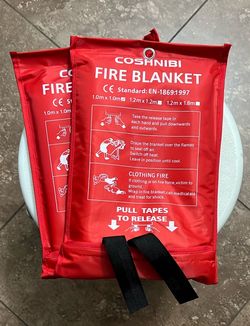 Fire blanket in vibrant red. Essential safety item for home or office.