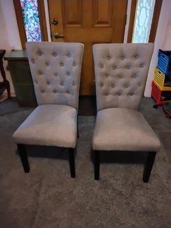 Gray dining chairs both for