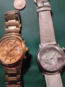 Gucci hologram watch with white band and guess watch