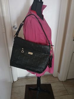 BELLA RUSSO Black Quilted Shoulder Bag with Zipper and Tassel Details
