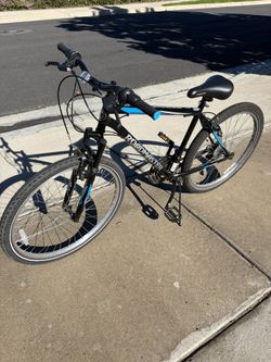 Roadmaster Granite Peak Men’s Mountain Bike, 26” Wheels, Black/Blue