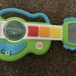Bright Starts Rattling Rockstar Guitar - Lights and Sounds Toy
