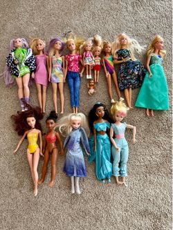 Mattel & Disney Barbie dolls with lots of accessories $100