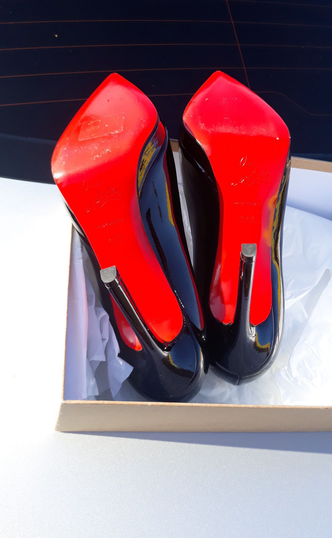 red soled high heels louis vuitton