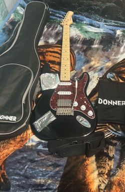 Beautiful Donner Eletric guitar and Fender Amp