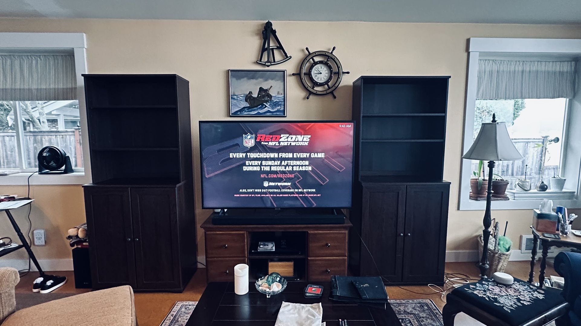 2 tall bookcases with cupboards/shelves