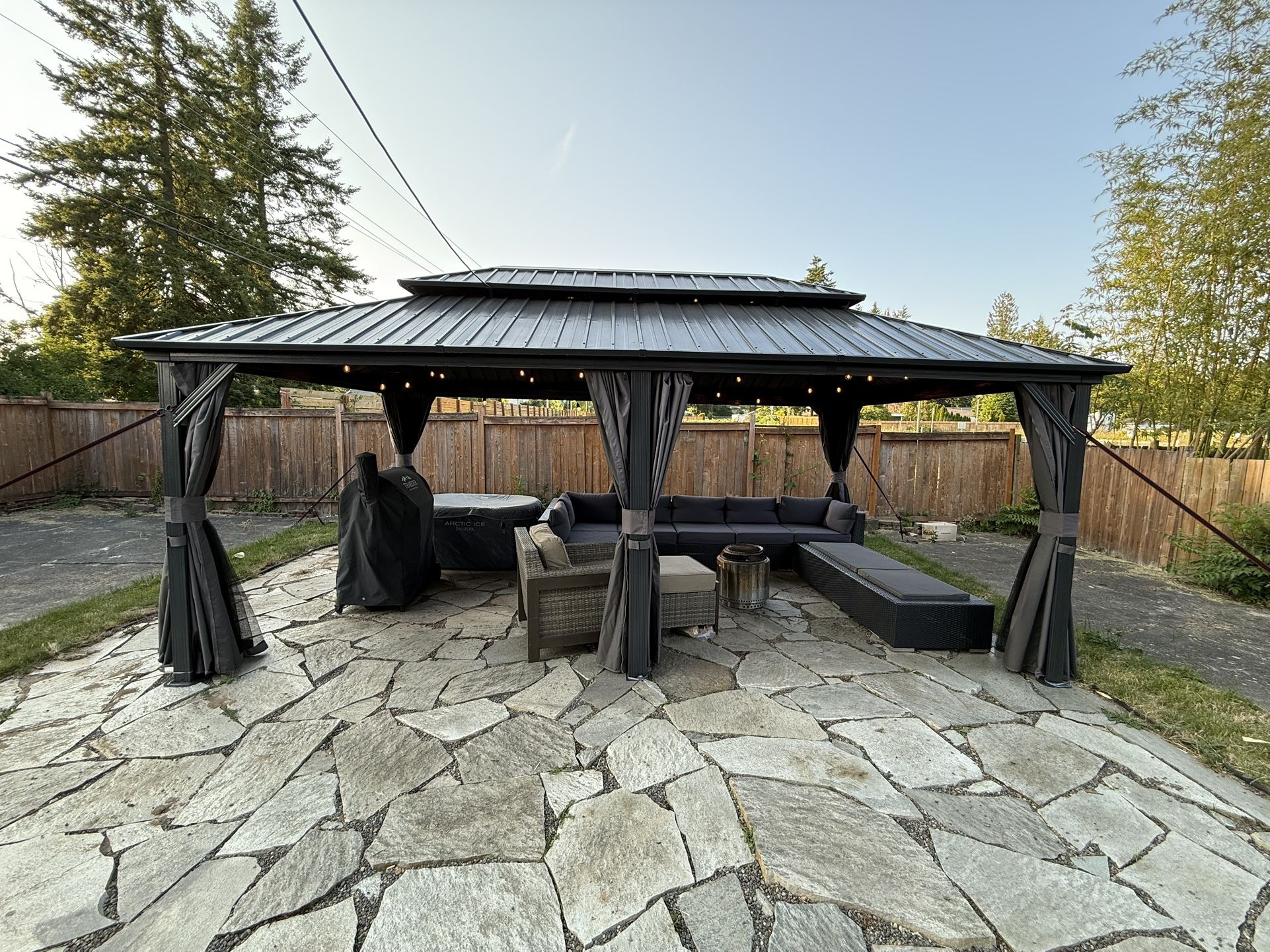 12x20 Outdoor Pavilion w/ Full Setup – Sectional, Solo Stove, Power + More!