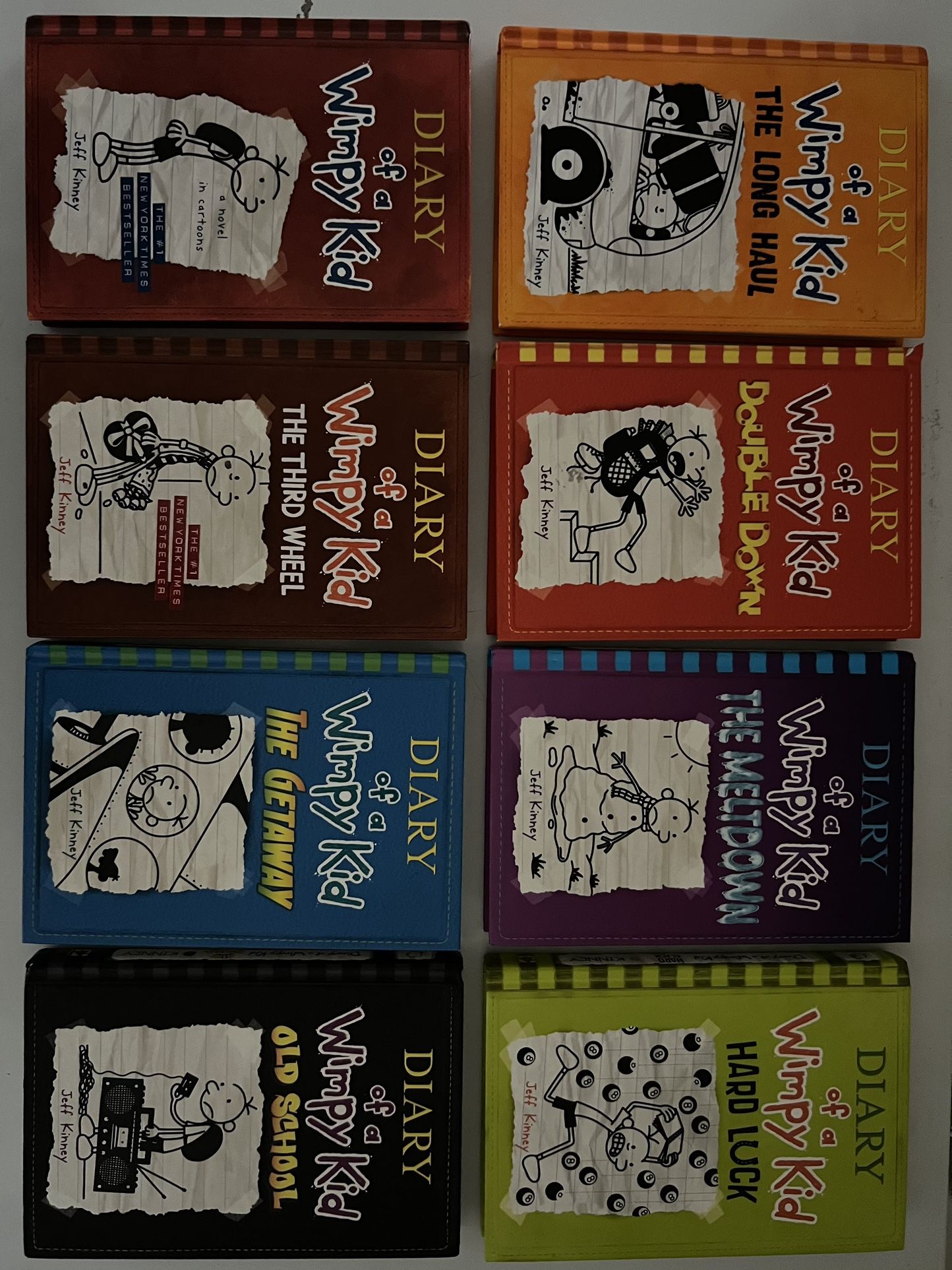 12 Diary of a Wimpy Kid and 2 Dog Man Books