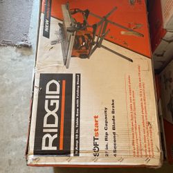 Ridgid 15 amp 10 inch table saw with folding legs new in the box $200