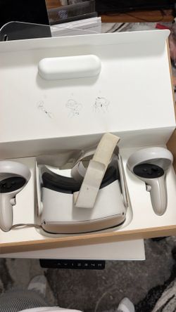 Oculus/Meta Quest 2 with both controllers and the original box.