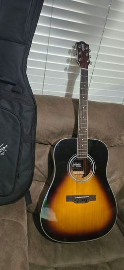 ACOUSTIC GUITAR $129