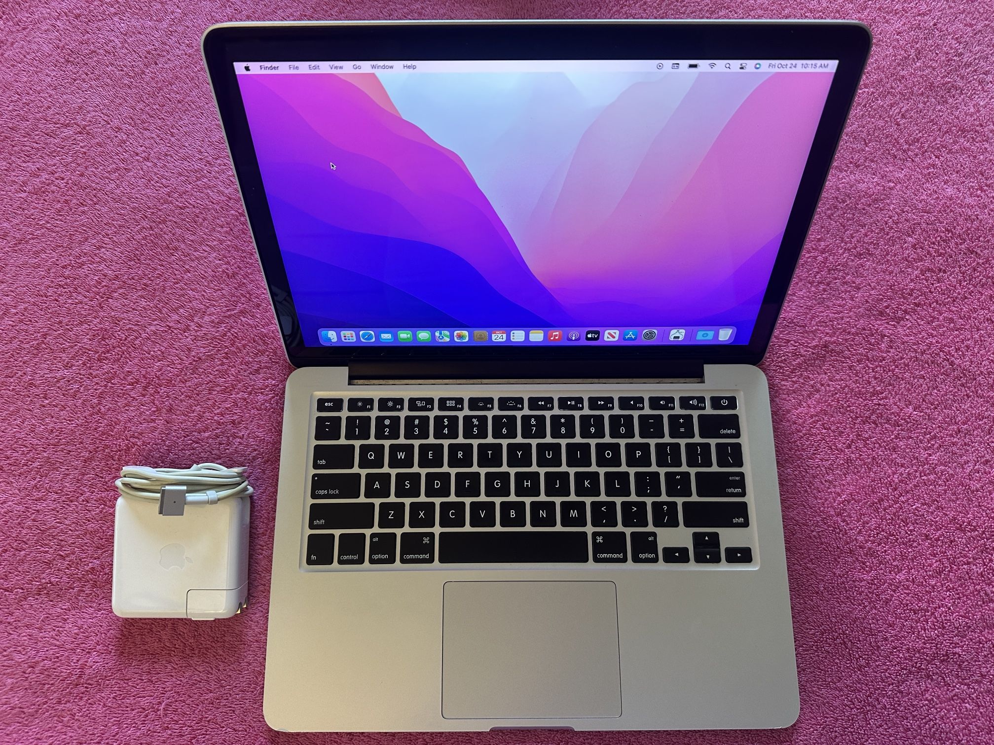 Early 2015 MacBook Pro Retina 13 inch, 2.7 GHz i5, 8 GB RAM, 500 GB SSD.