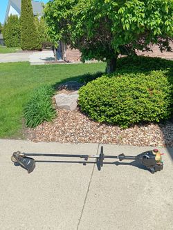 New carburetor large powerful 32cc weed trimmer 2 cycle. $80 with trade-in or $100. 23 mile and Card Macomb Township Michigan
