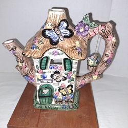 Butterfly teapot shaped tealight house. Elements
