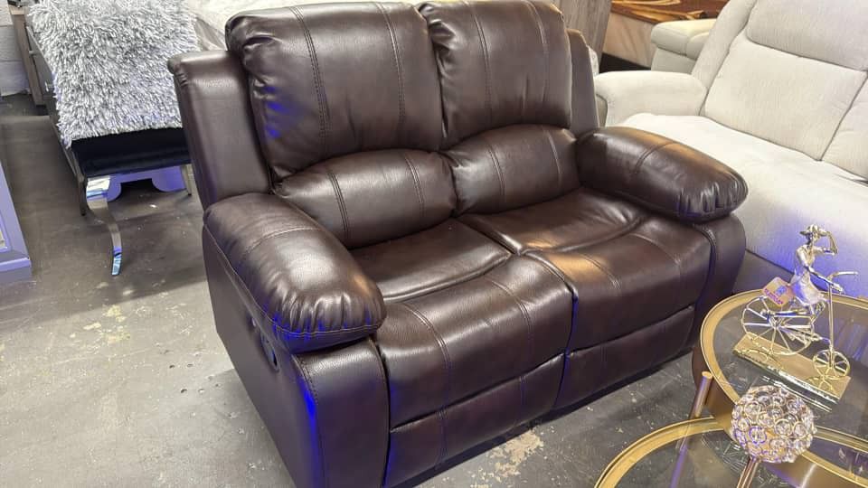 Brown Leather Reclining Sofa and Loveseat with LED Lights.