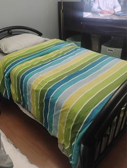 Twin size bed with mattress