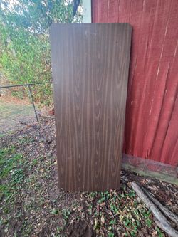 Heavy-duty folding utility or party table wood does not fold in middle heavy