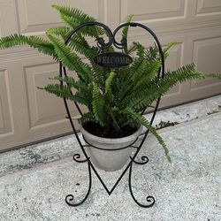 Plant Stand With A Welcome Signed And Boston Ferns Plants 