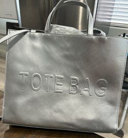 New 14 x 17” silver bag